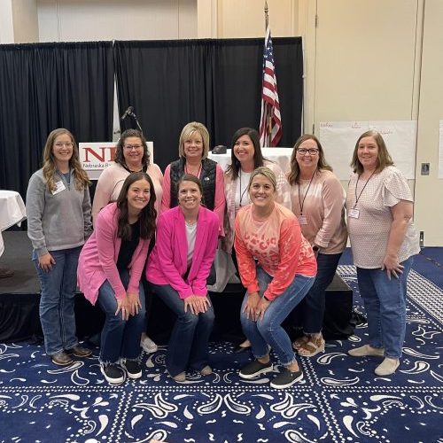 Midwest bank staff posing for a picture at the 2023 Women In Banking Conference