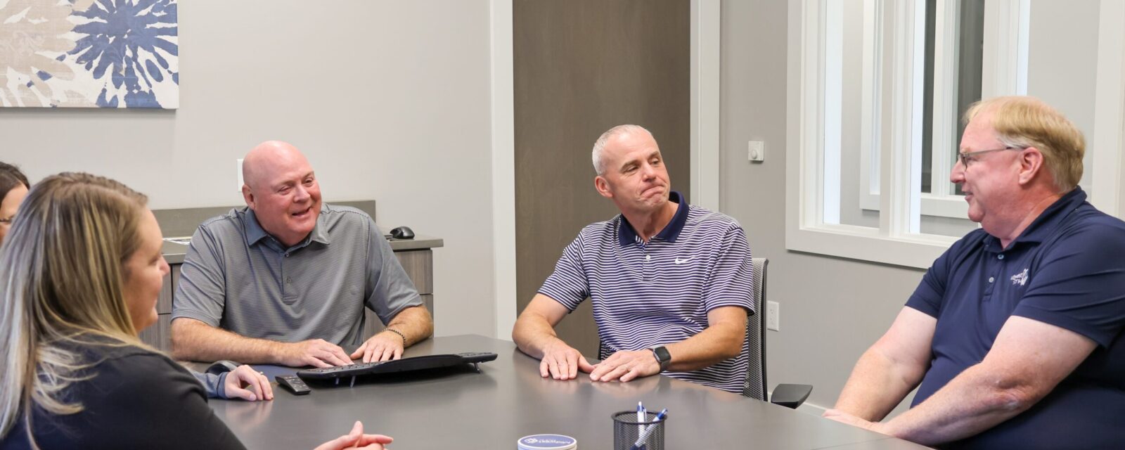 Group in conference room York Copy