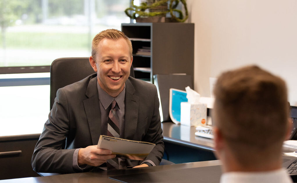 Steven Petersen, an assistant Vice President and Mortgage Loan Officer at the Norfolk Branch, talks with a client